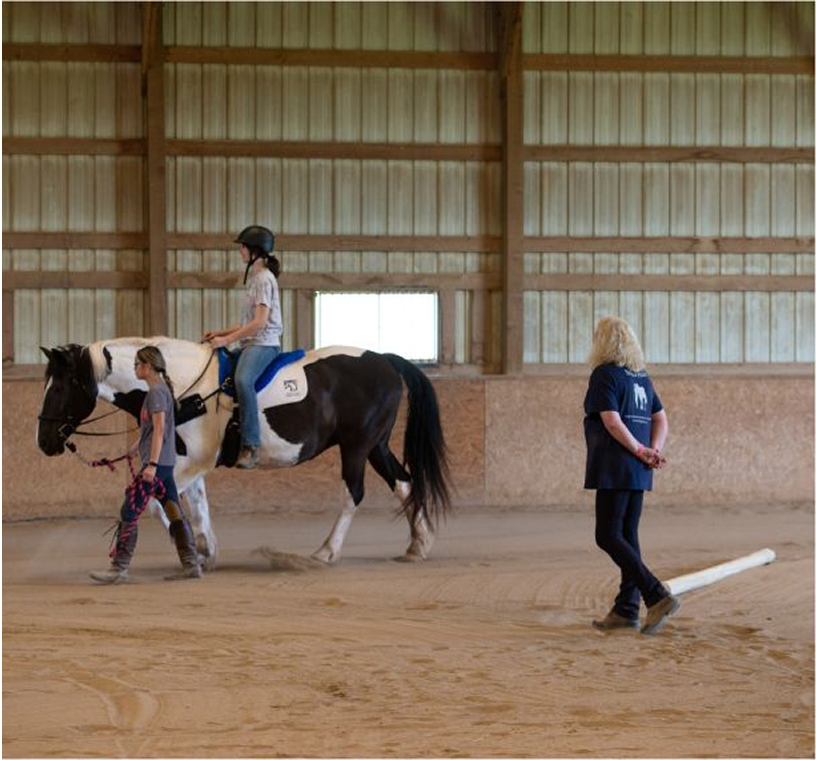 Rider with leader and instructor